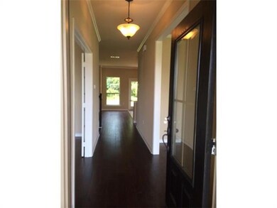 Foyer. Welcoming foyer with beautiful wood floors.