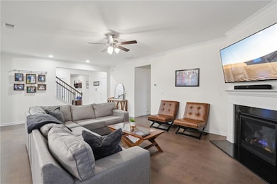 Living room featuring dark hardwood / wood-style f
