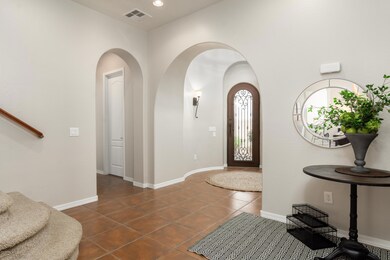 Foyer on right den, left to main area