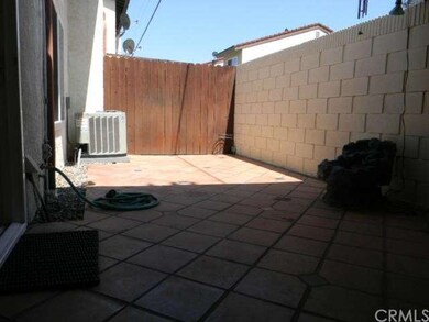 Back patio is I/2 shade and sun, no one behind