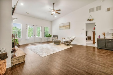 Open concept family room with fireplace