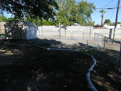 Yard/Garden. RV gate and storage shed.