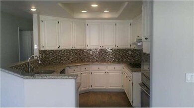 Refinished kitchen with granite counter top, full 