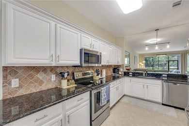 11111 Corsia Trieste Way unit 104, Bonita Springs, FL 34135 - photo 7