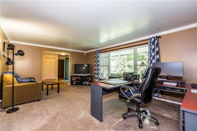 Living room with large window to allow natural lig