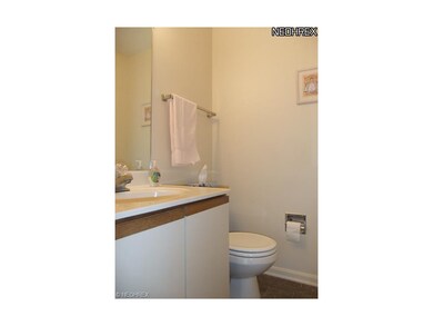 A half bathroom is located off of the foyer and pr
