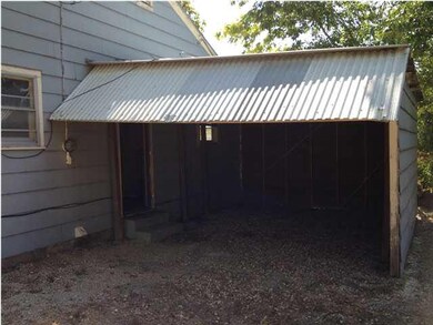 carport in the back