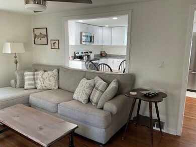 Living room looking into kitchen