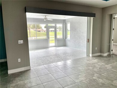Entry to 4 Season room/ Glass enclosed lanai w/ st