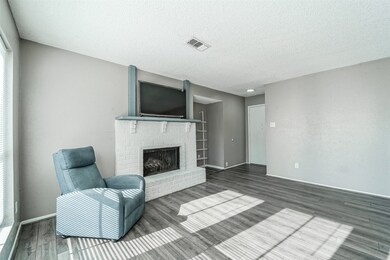 The home is bathed in natural light, thanks to a m