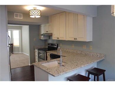 new kitchen with granite counter top fresh paint