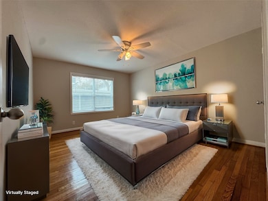 Bedroom 2. Hardwood floors, tons of natural light.