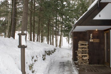 With outdoor stream and walled walkway