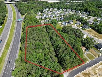 Aerial view of residential area with a major roadw