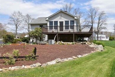 Side of house with sunroom