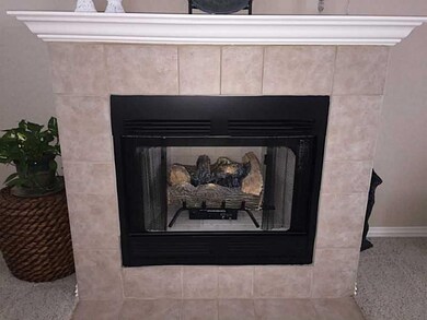 Living Room. Gas log fireplace.