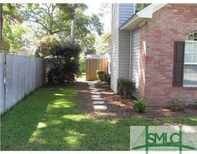 Exterior Front. Pavers to rear fenced yard with sp