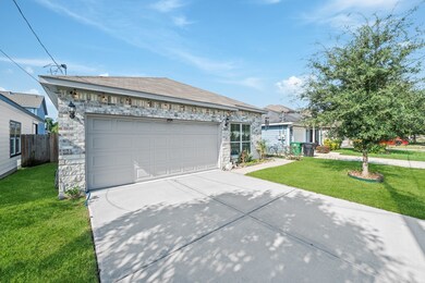 A single-story home features a two-car garage with