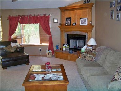 View from the front door, woodburning fireplace, l