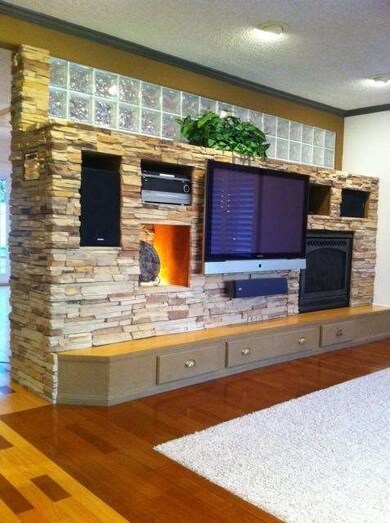 Custom built entertainment center with built in remote gas fireplace .... Samsung 50