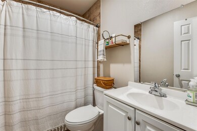 Primary bathroom for unit 1201 featuring shower/tu