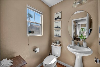 Half bathroom featuring healthy amount of natural