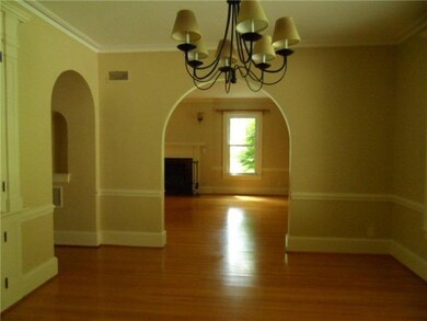 Dining Room. Formal diningrm. with classic arched 