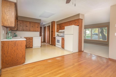 Open floor plan from kitchen to dining area and living room.