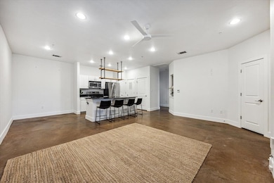 Kitchen with stainless steel appliances, recessed