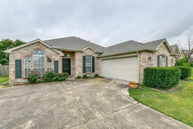 Ranch-style home featuring a garage