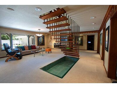 Property Photo. Floating staircase above pond acce
