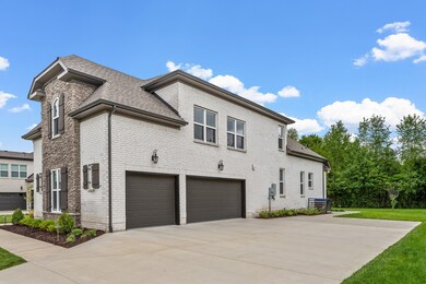 The home has a 3-car garage with an extended driveway, providing additional parking.