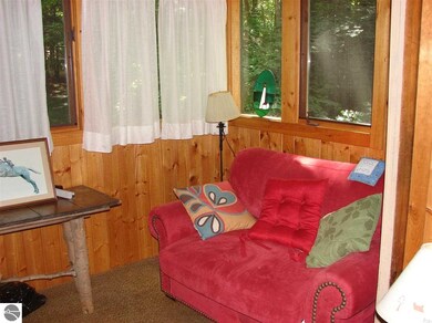 The Family Room is warm and cozy and is separated 