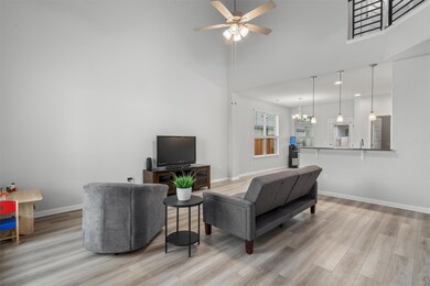 Living area featuring wood finished floors, ceili