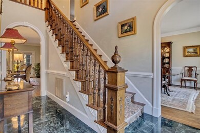 2 Story entry foyer with stunning staircase