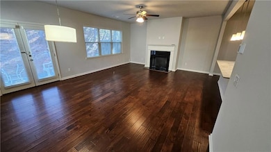 Unfurnished living room featuring a fireplace with