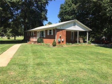 GREAT CORNER LOT - CARPORT TO STAY OUT OF THE RAIN