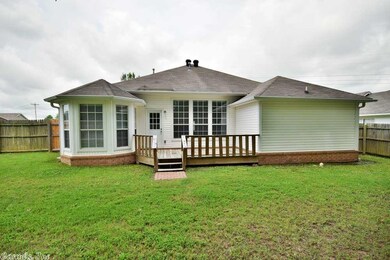 Back view- beautiful porch and large yard.