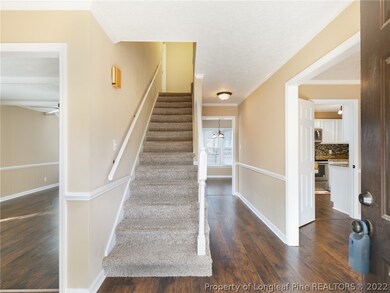 Foyer and stairs to 2nd floor