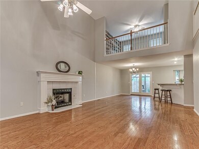 Gorgeous hardwood floor and soaring ceilings make 