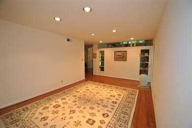 Huge dining room with shared shelves with living r