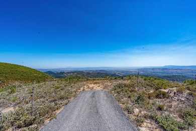 Arriving to building site with views beyond.