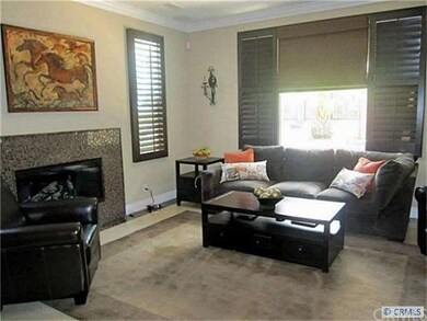 Another view of Great Room with plantation shutter