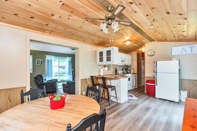 Beautiful pine ceiling add warmth and style to the kitchen