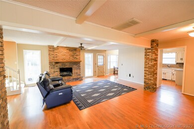Large living room with woodburning fireplace