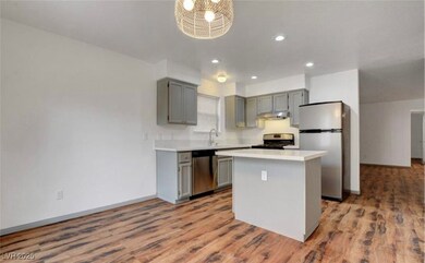 Kitchen featuring a center island, appliances with