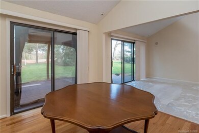 Vaulted ceiling in dining room. Double sliding gla