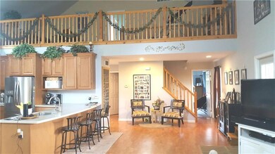 Open concept kitchen/dining/living