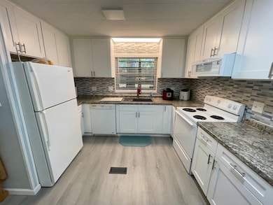 308 Juniper Cir, Lady Lake, FL 32159 - photo 6