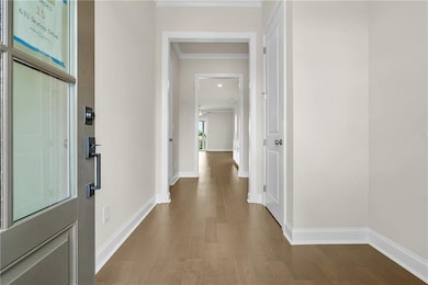 Entrance to the home walking into the front door.